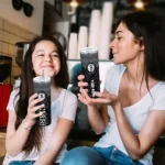 customized brooklyn nets spiral burst print black skinny tumbler best selling 1.webp